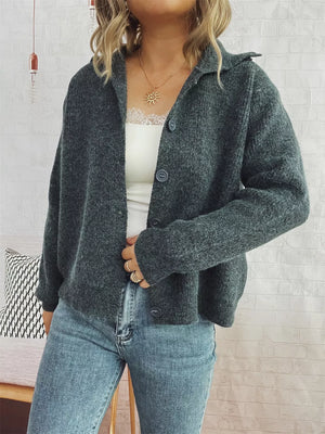 Gray ribbed button-up cardigan with polo collar and two visible buttons.