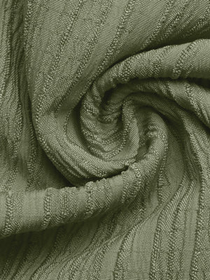 Crinkled wide-leg maternity pants in olive green with textured fabric detail.
