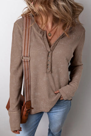 Taupe waffle knit henley blouse with button detail and notch neckline.
