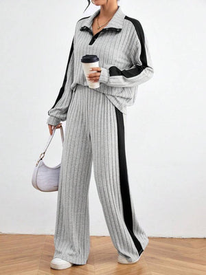 Light gray ribbed lounge set with contrast black stripe detail and polo collar.
