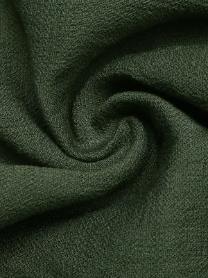 Dark green cotton blend fabric detail of a maxi gown.