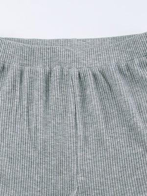 Grey ribbed knit pajama shorts with elastic waistband and drawstring detail
