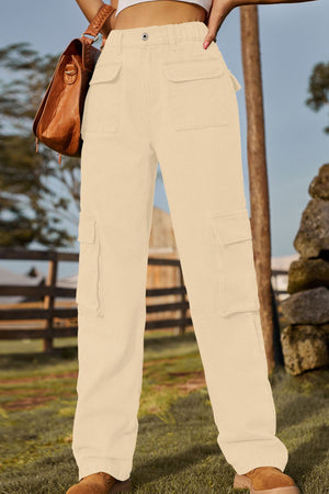 Utility pocket denim trousers in tan with multiple cargo pockets and a drawstring detail.