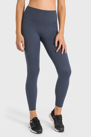 Sculpted high-waist performance leggings in gray with a seamless design.