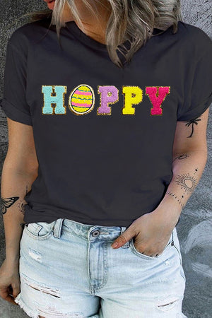 Black graphic tee with sequin "Hoppy" Easter egg design