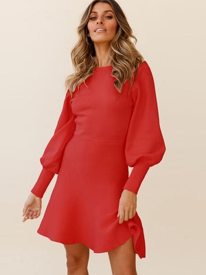 Red knit fit-and-flare dress with balloon sleeves and ribbed texture
