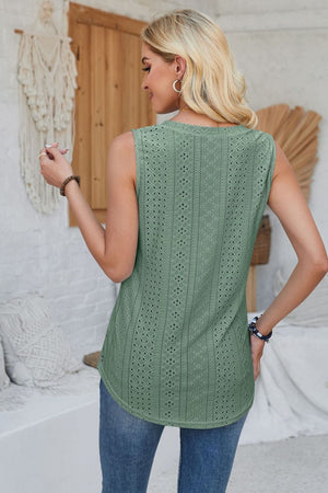 Sage green perforated sleeveless button-down top with eyelet details.