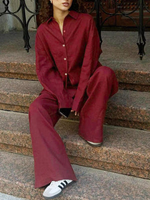 Burgundy relaxed fit button-up shirt and wide-leg pants set with pearl buttons.