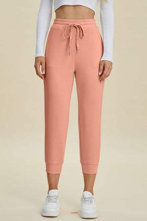 Coral joggers with drawstring waist and cuffed ankles