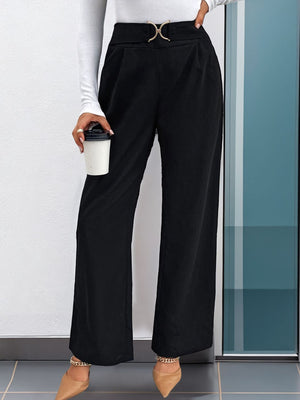 Black wide leg trousers with gold buckle detail and high waist