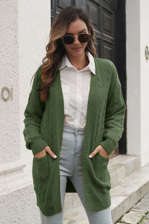 Army green cable knit longline cardigan with pockets and ribbed cuffs.