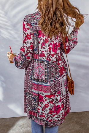 Patchwork print duster shirt jacket with floral and geometric patterns in pink, blue, and gray.
