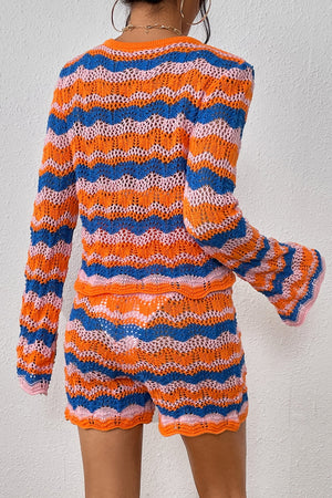 Crochet flare set with chevron stripes in orange, blue, and pink. Bell sleeves and shorts with scalloped trim.