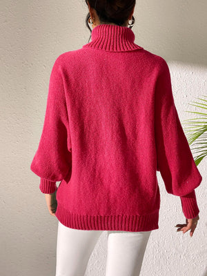 Deep Red turtleneck sweater with balloon sleeves and ribbed cuffs and hem.