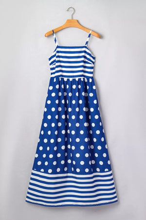 Blue polka dot maxi swim dress with spaghetti straps and striped top and hem