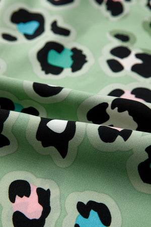 Sage leopard print resort shirt and trousers fabric detail