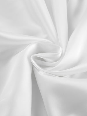 White flowy maxi skirt fabric detail with soft folds