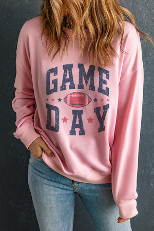 Game Day graphic crewneck sweatshirt in blush pink with football and stars design
