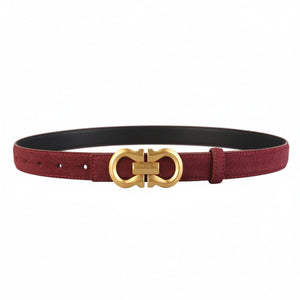 Red suede leather belt with gold double G buckle and black lining.