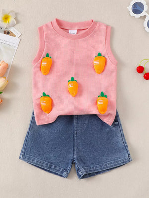 Baby girls pink waffle knit tank top with carrot appliqués and denim shorts.