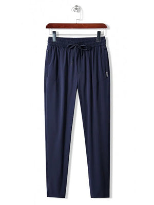 Men's Royal Blue drawstring active pants with elastic waistband and side pockets.