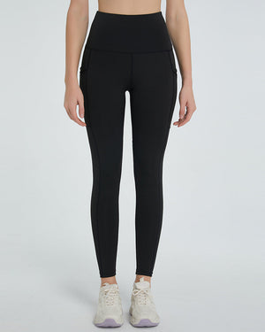 Black pocketed sculpt leggings with a high waist and full length.