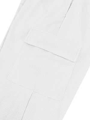 White waffle knit joggers with a cargo pocket detail.