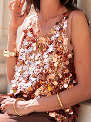 Dazzling sequin embellished tank top in a copper and silver mix, with a sheer neckline and armholes.