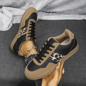 Leopard panel retro sneakers in taupe and black with lace-up closure.