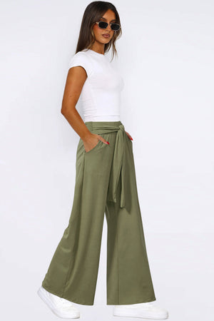 Moss wide-leg flow pants with self-tie belt and pockets.