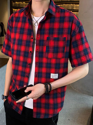 Red and blue plaid short sleeve button-down shirt with chest pocket