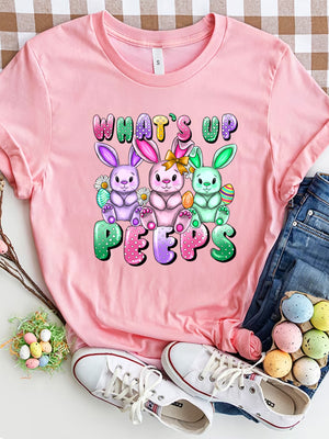 Pink Easter Bunny Graphic Tee with "What's Up Peeps" text and three cartoon bunnies.