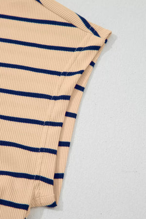 Ribbed cotton t-shirt with navy horizontal stripes and mock neck detail.