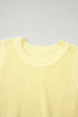 Yellow knit sweater vest with crew neck and textured stitch detail.