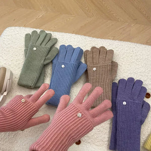 Convertible ribbed knit touchscreen gloves in pink, blue, green, purple, and tan with button detail.