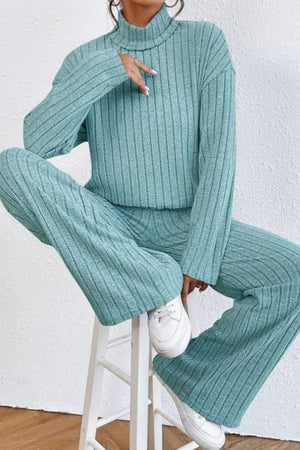 Aqua ribbed knit turtleneck lounge set with wide leg pants.