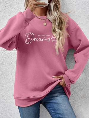 Dreams Scripted Oversized Sweatshirt in Blush Pink with crew neck and long sleeves.