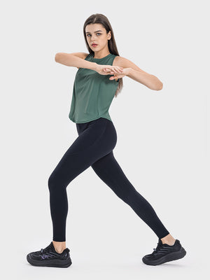 Green Cross-Back Performance Tank top with a round neckline and sleeveless design.