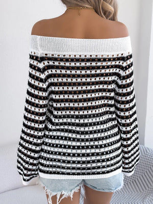 Off-shoulder striped mesh knit sweater with open knit details and a white ribbed neckline.