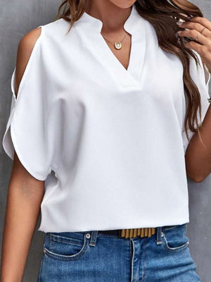 White open-shoulder blouse with mandarin collar and v-neck detail