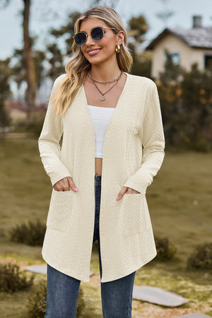 Cream textured open-front cardigan with pockets and long sleeves.