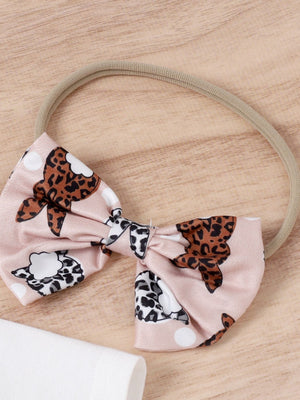 Pink baby headband with bunny and leopard print bow detail