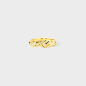 Gold ring with diamond-kissed knot detail, 18K gold-plated.