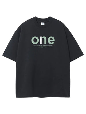 Black oversized graphic t-shirt with crew neck and cotton fabric.