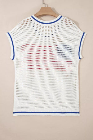 White eyelet knit sweater with cap sleeves, blue trim, and a red and blue American flag pattern.