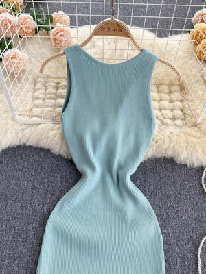 Light blue ribbed knit midi dress with a scoop neck and sleeveless design.