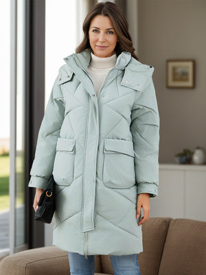 Sage diamond quilted hooded puffer coat with snap flap pockets and zip front.