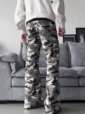 Camouflage utility wide-leg sweatpants with cargo pockets and a relaxed fit.