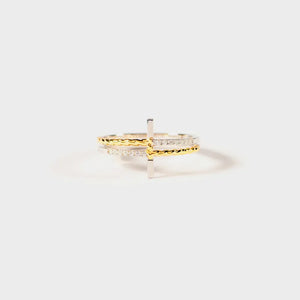 Gold and silver stacked ring with crossbar detail and pave stones