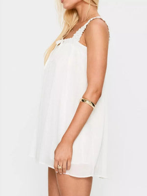 White frilled square neck mini dress with drawstring tie and ruffled straps.
